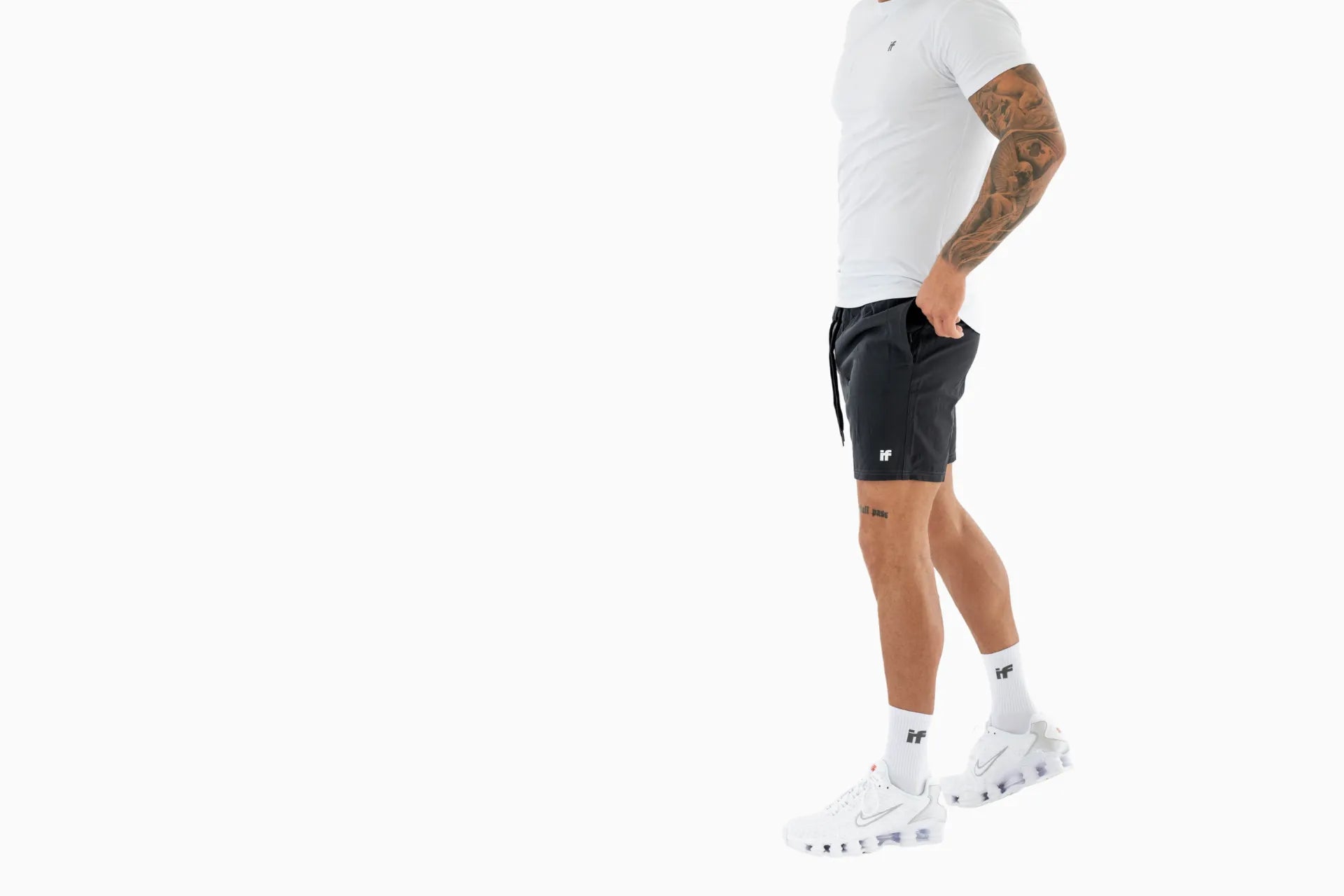 man wearing black gym shorts 