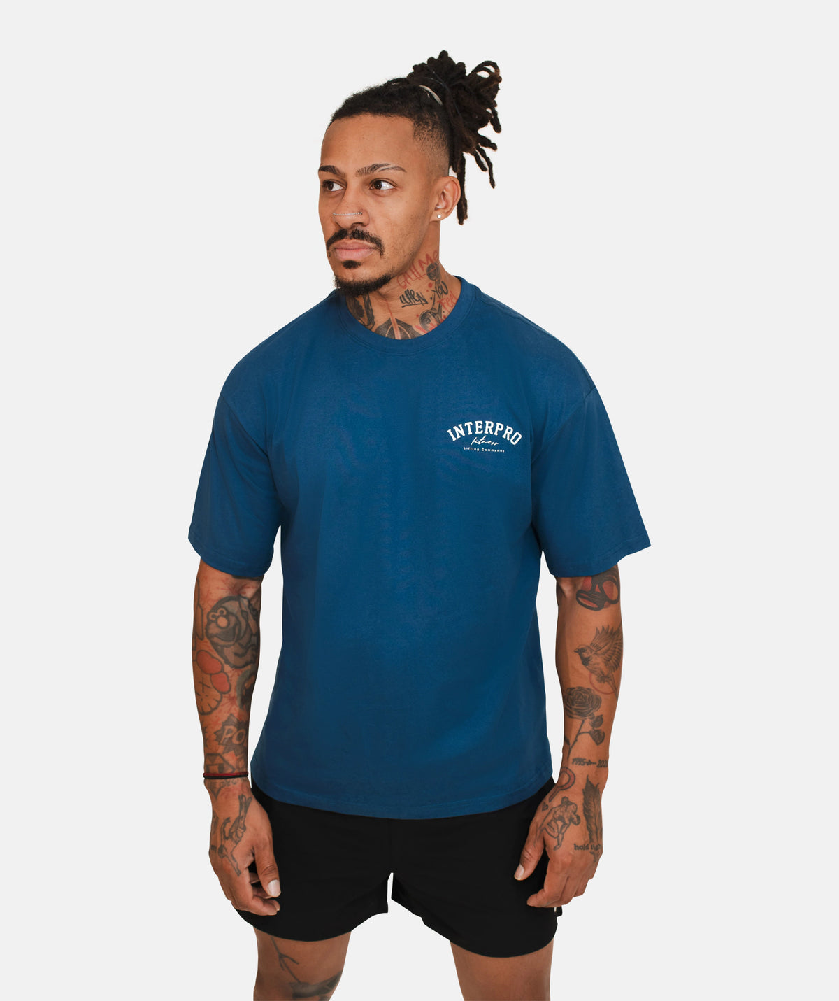 blue t-shirt and black shorts