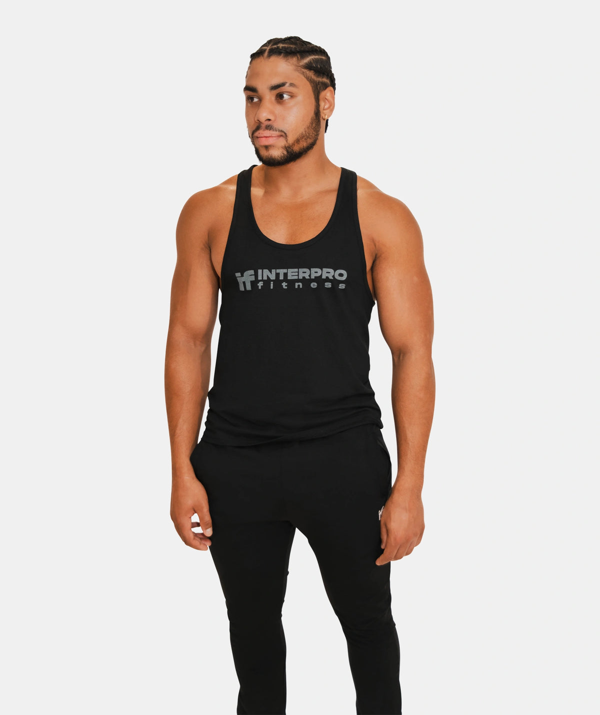 man wearing a black tank top