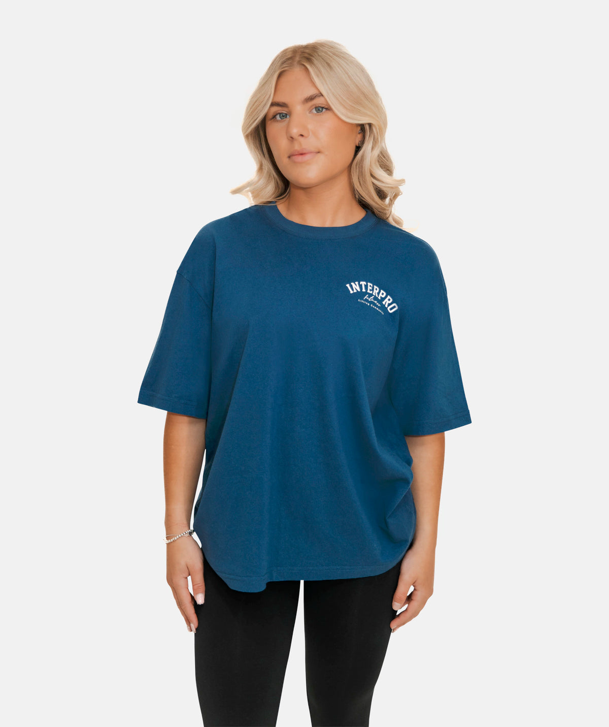 wearing a blue oversized T-shirt