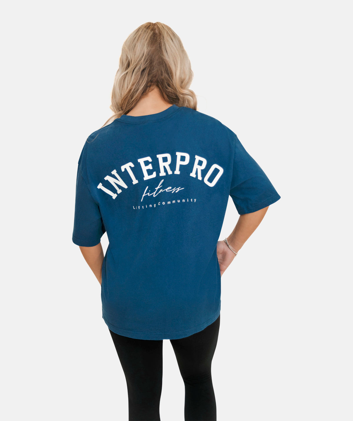 wearing a blue oversized T-shirt
