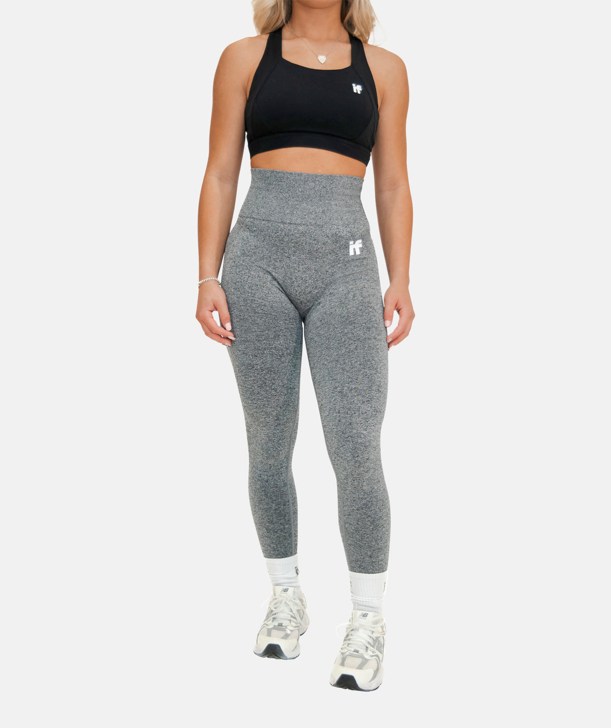 wearing grey sculpting leggings 
