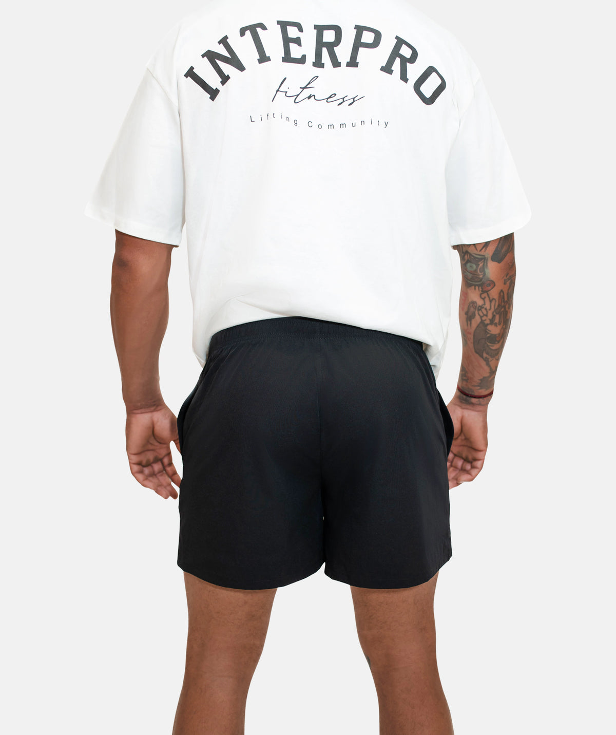 white t-shirt and black shorts
