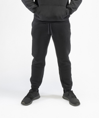 Interpro Fitness Men’s Black Regular Fit Gym Joggers, front view showing full shape and cuffed ankles