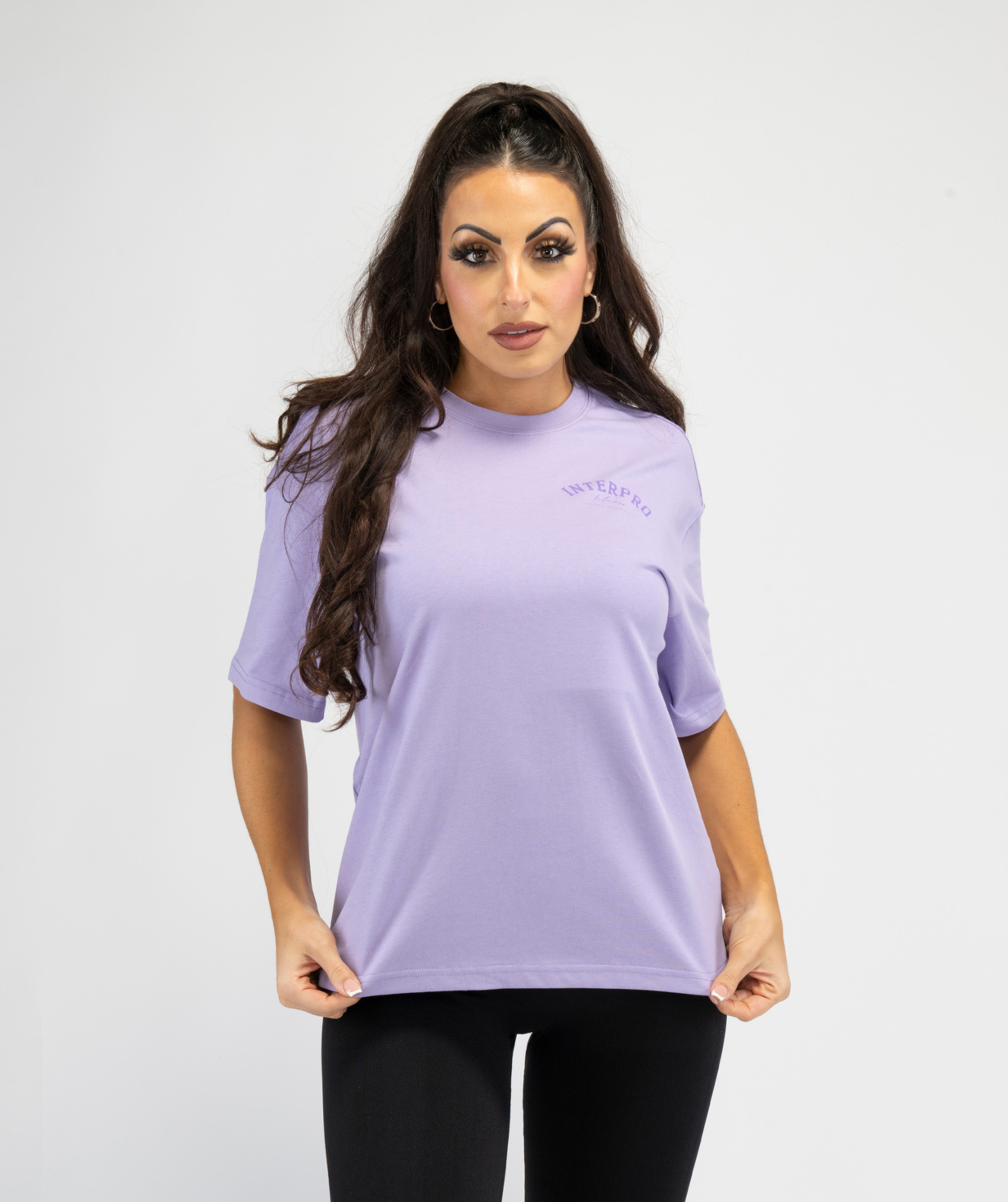 Front view of women’s lilac oversized gym T-shirt showing relaxed fit and soft drape