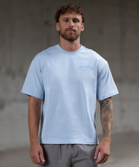 Light blue oversized Interpro Fitness men’s training t-shirt worn front-on