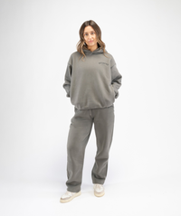 Model wearing grey straight leg Interpro Fitness joggers full body