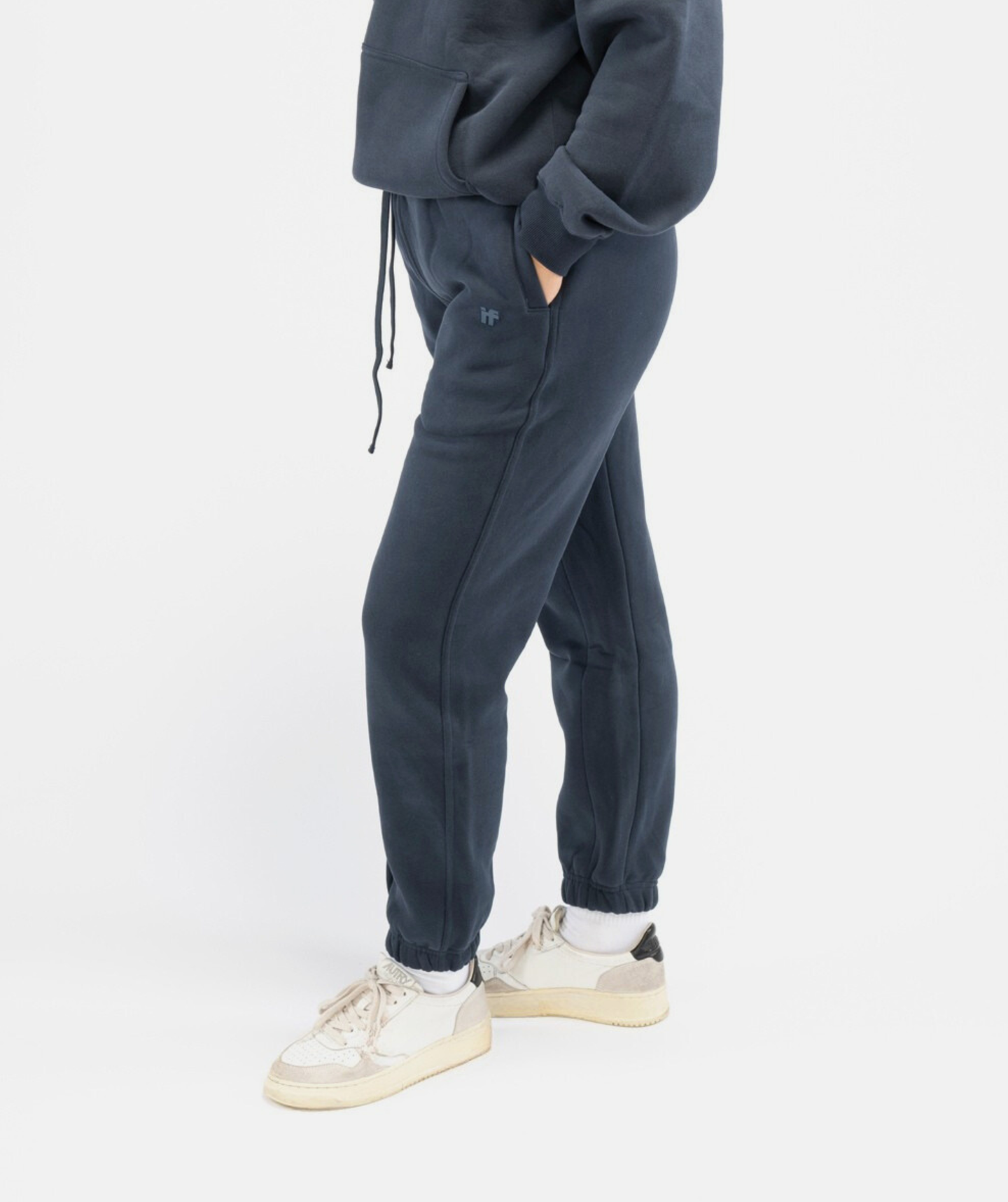 Womens navy blue Interpro Fitness joggers side angle