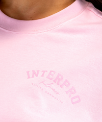 Close-up of Interpro Fitness logo on women’s oversized T-shirt showing printed detailing