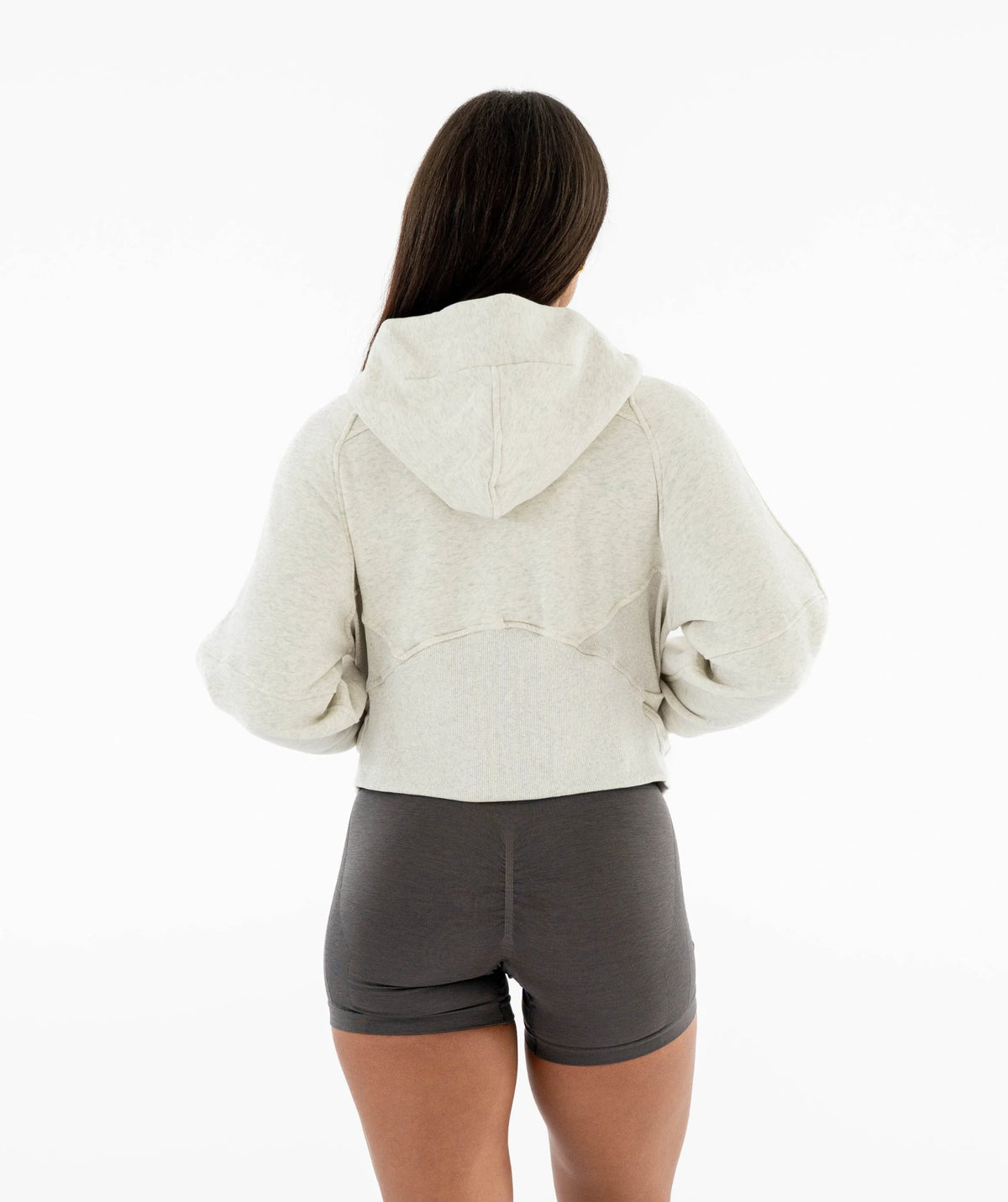 beige hoodie and gray shorts 