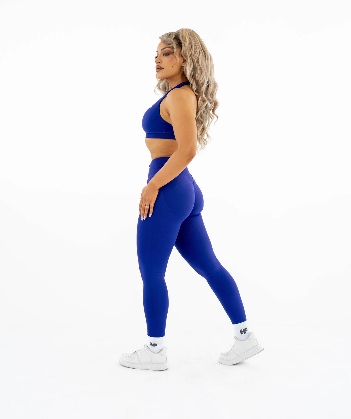 blue athletic outfit on a white
