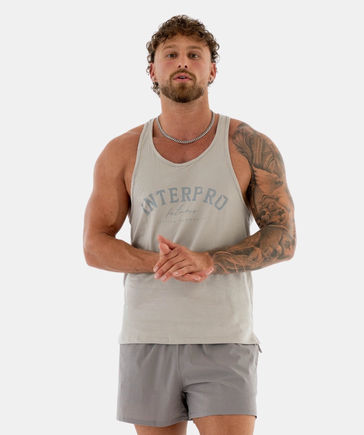 Man wearing a gray tank top