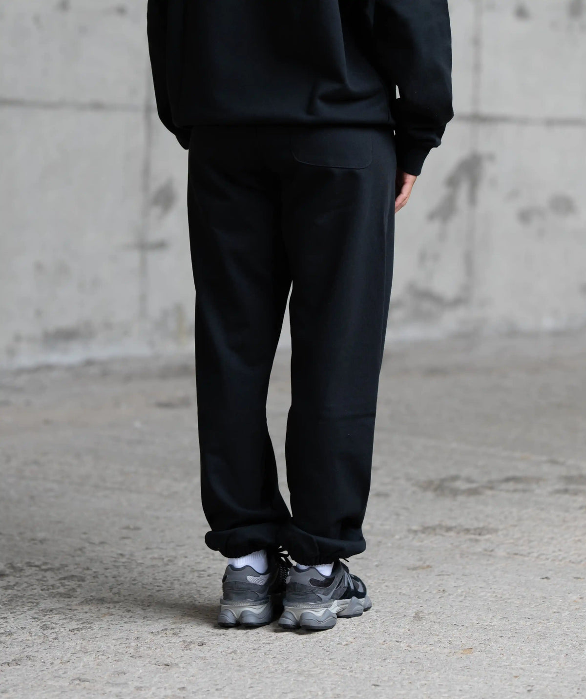 black pants and shoes standing