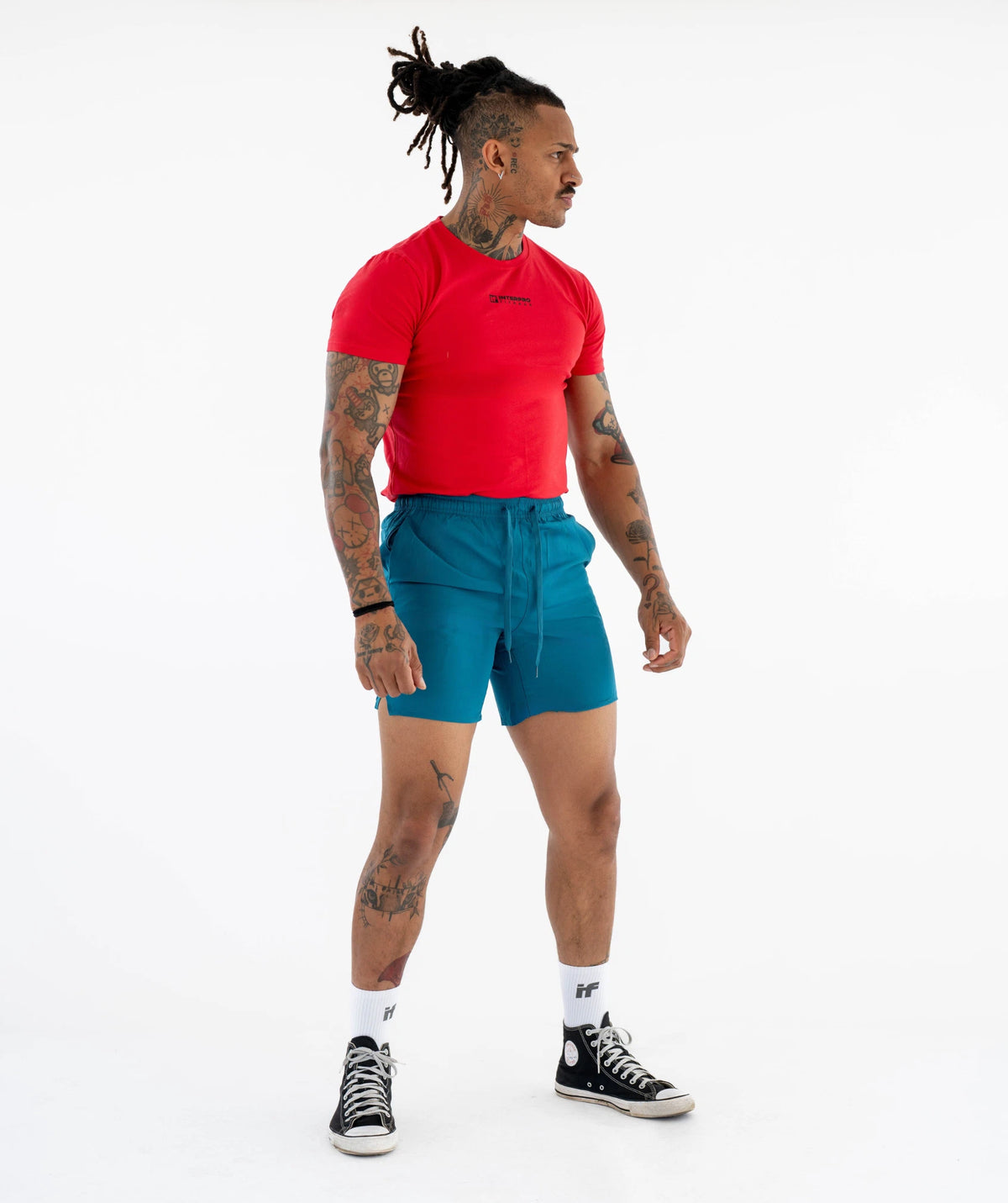 red shirt and blue shorts 