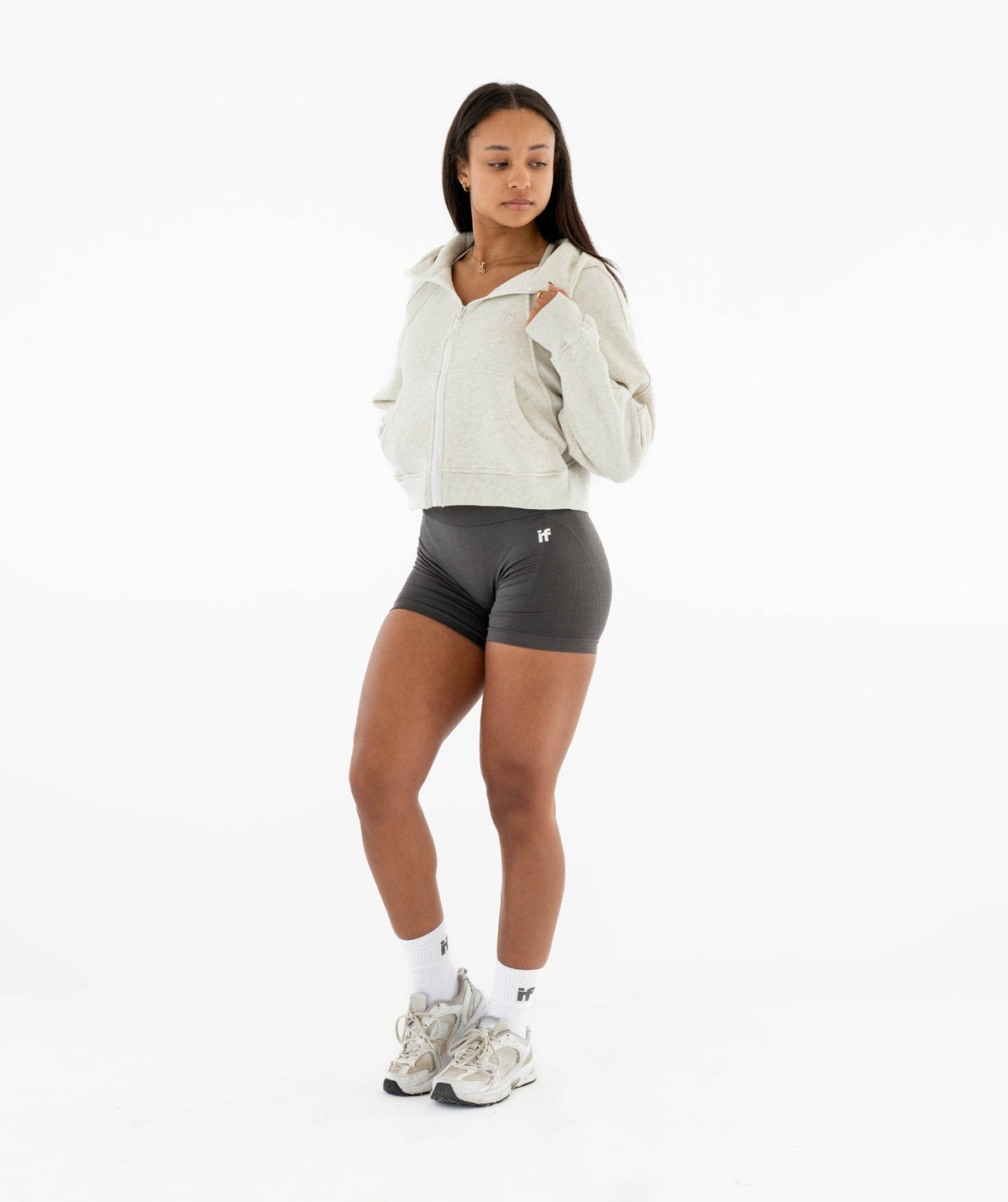 white hoodie, gray shorts