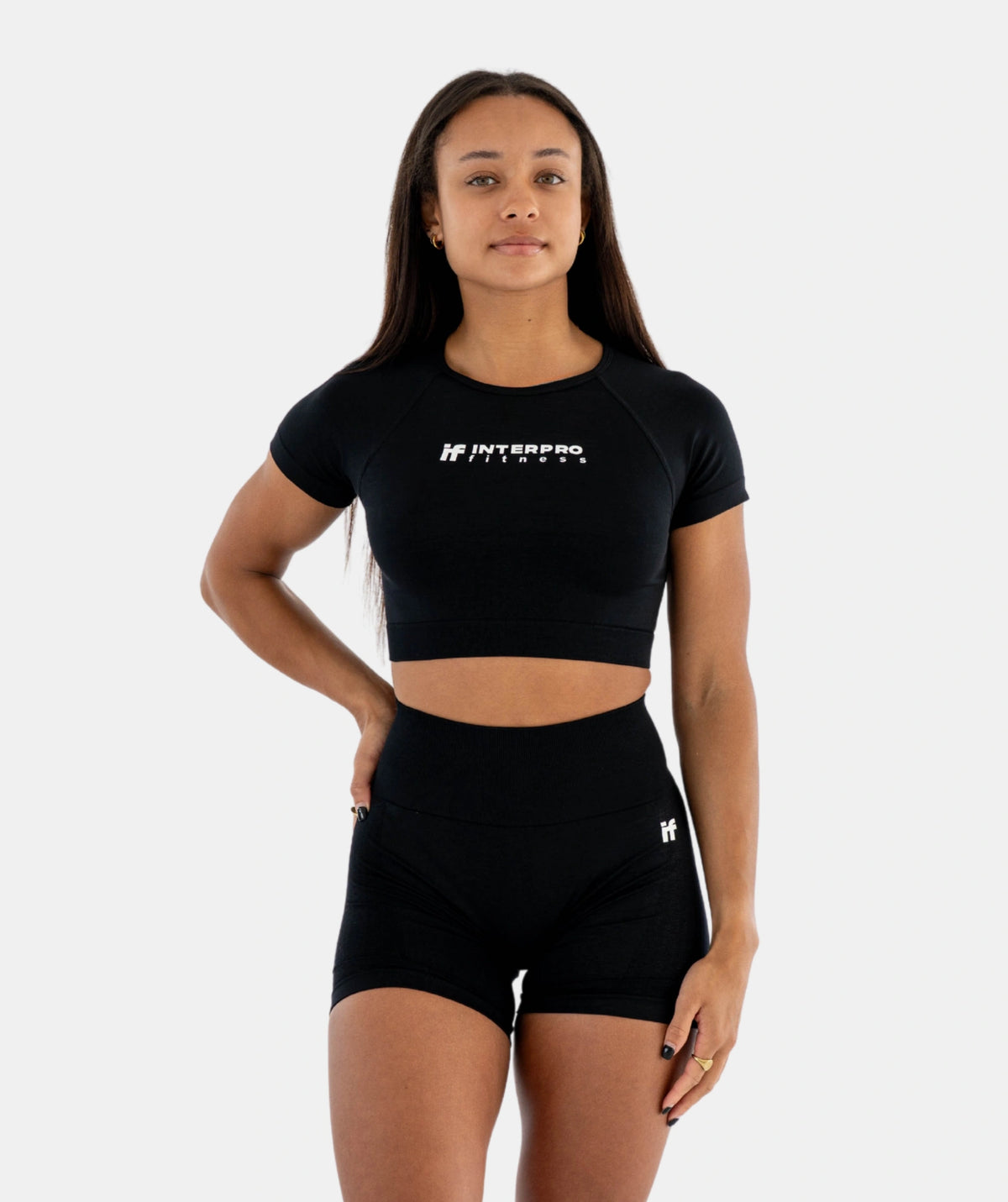 black athletic outfit with a logo