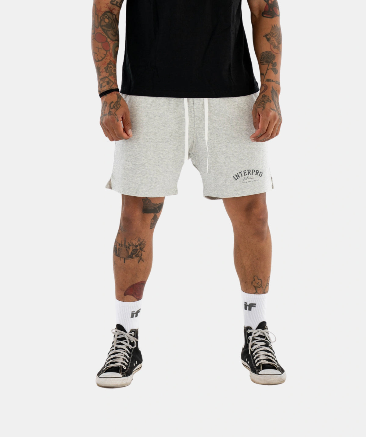 gray shorts with a brand logo