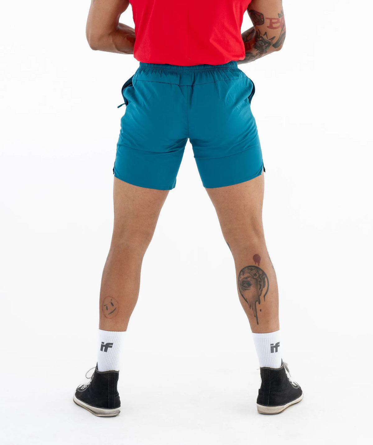 blue shorts and a red