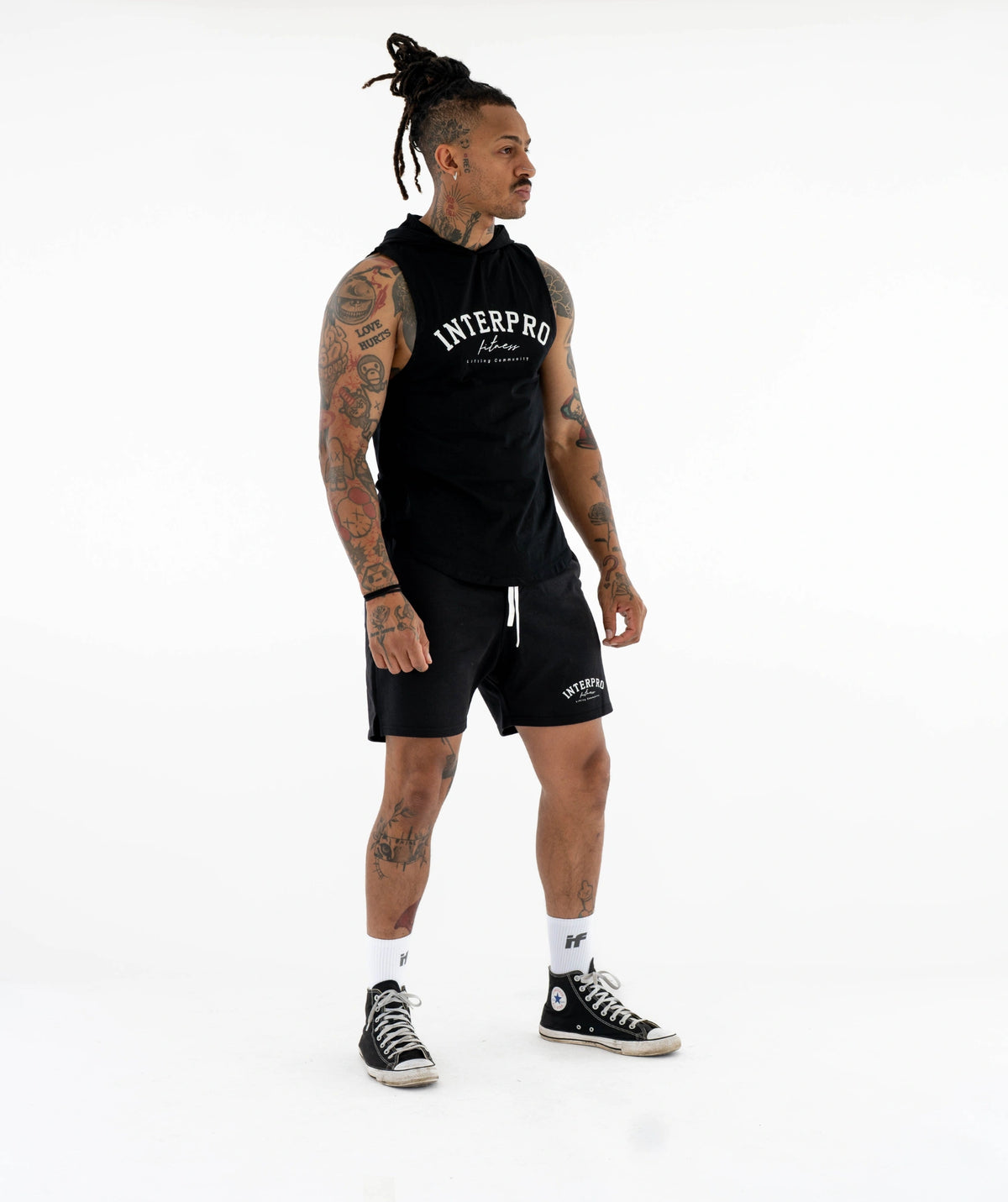 Man black sleeveless shirt, shorts 