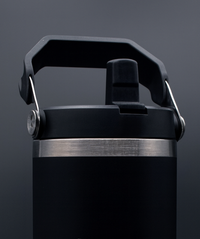 interpro fitness metal water bottle in studio lighting showing spout and handle