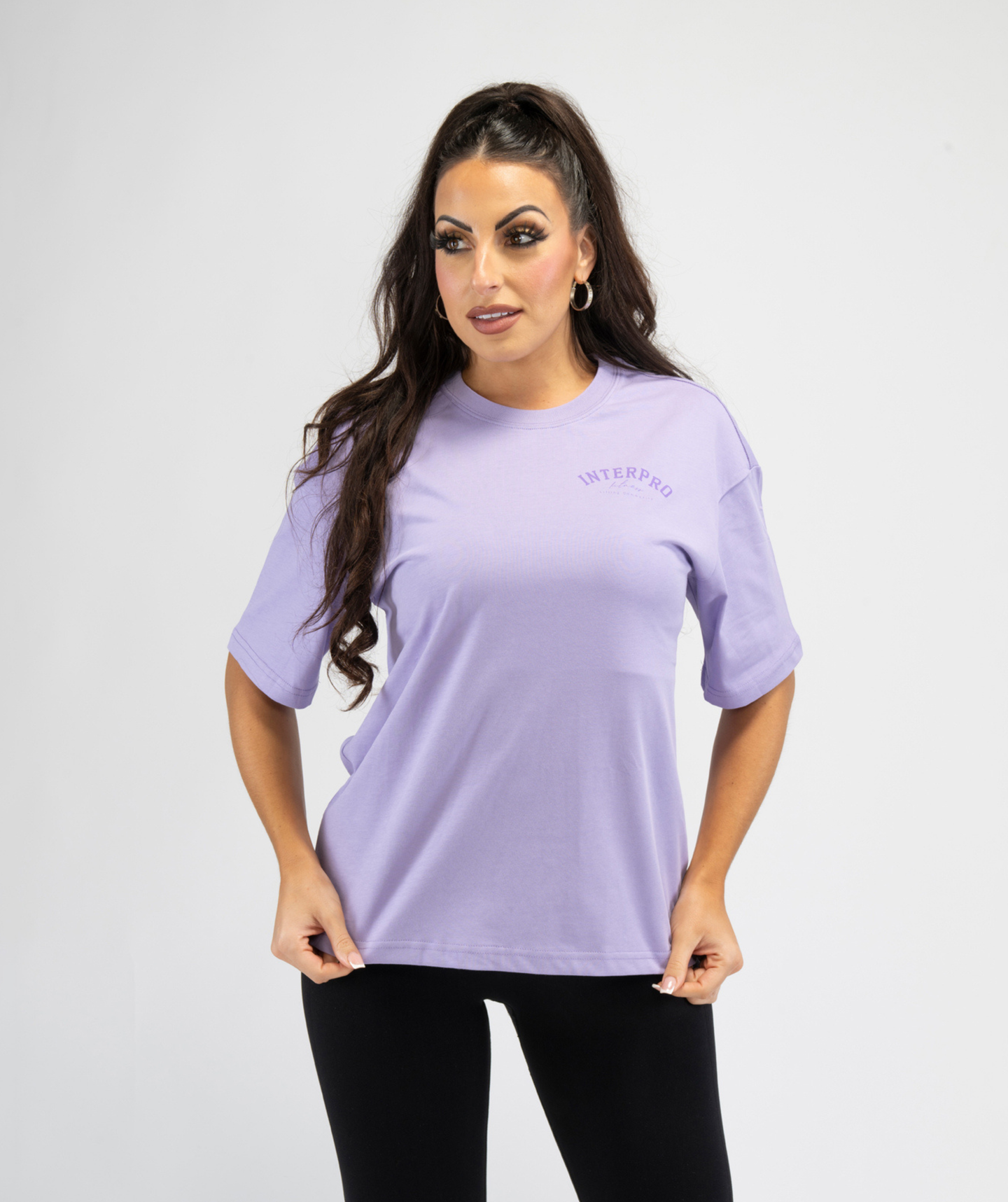 Front-facing shot of lilac oversized workout T-shirt highlighting loose silhouette and breathable fabric