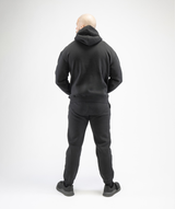 Full-body rear outfit image featuring Interpro Fitness Men’s Black Regular Fit Joggers combined with gym wear.