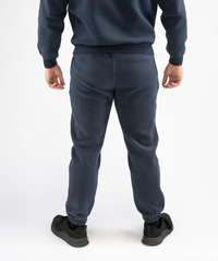 Back view of Interpro Fitness Navy Blue Men’s Regular Fit Joggers with cuffed ankles and clean panel design.