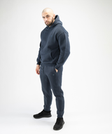 Full-body outfit image featuring Interpro Fitness Men’s Navy Blue Regular Fit Joggers styled with gymwear.