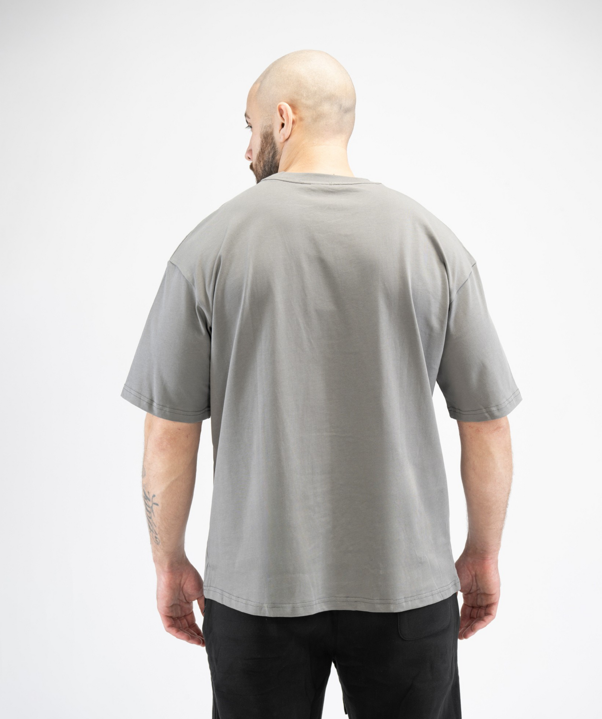 Rear view of Men’s Grey Oversized Gym T-Shirt from Interpro Fitness, clean back design.