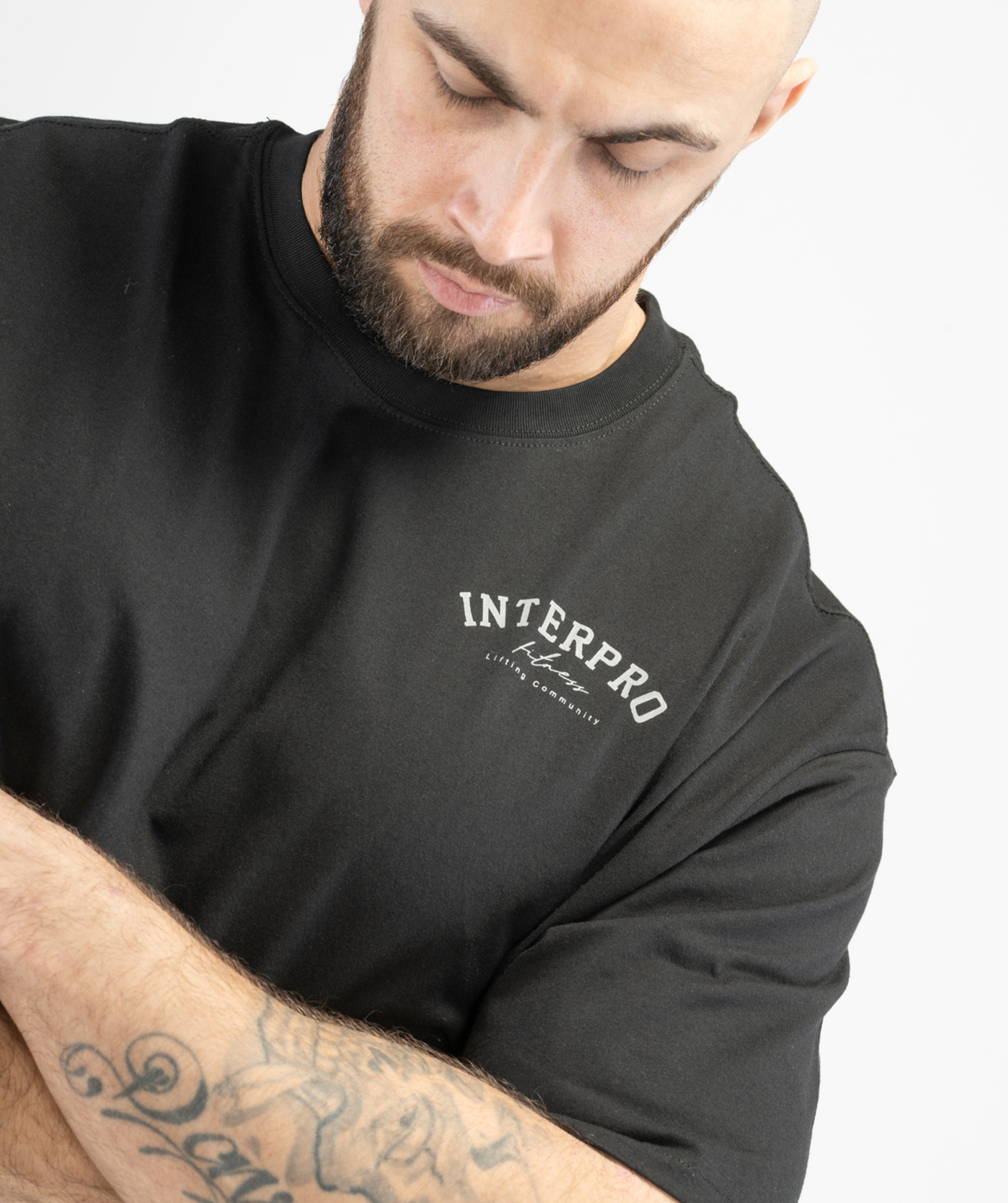 Close-up view of men’s oversized black gym T-shirt from Interpro Fitness