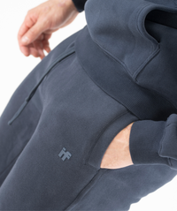 Detail shot of side pocket stitching on Interpro Fitness Men’s Regular Fit Joggers in Navy Blue.