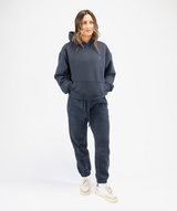 Model wearing navy Interpro Fitness joggers full body