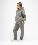 Full-body front outfit featuring women’s grey oversized Interpro Fitness hoodie styled with straight leg matching joggers