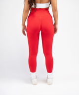 Back angle full-body view of women’s red sculpt leggings showing glute-enhancing cut and smooth finish