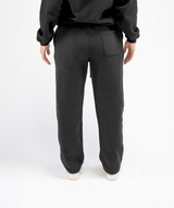 interpro fitness womens straight leg black joggers back view on model