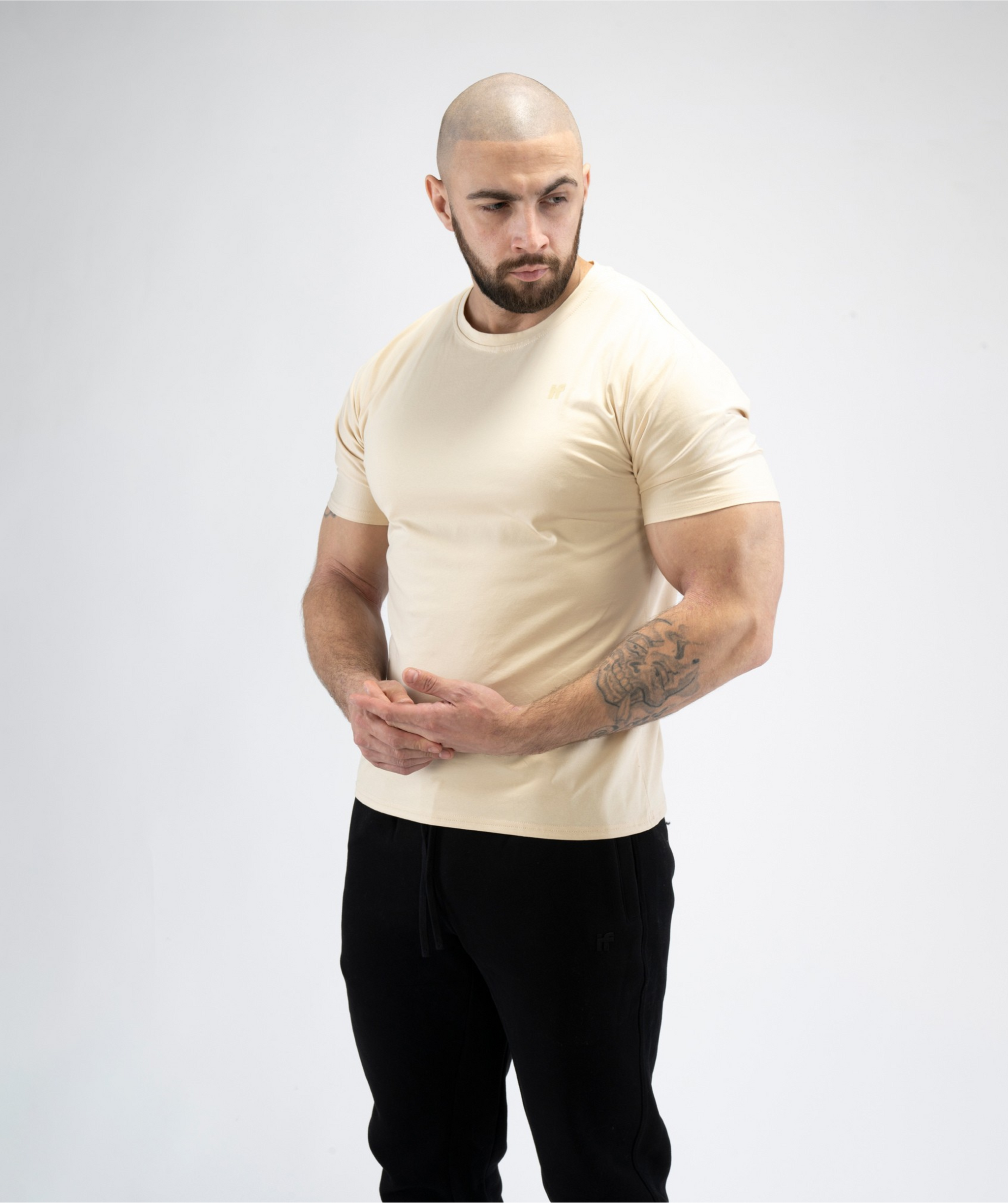 Interpro Fitness Men’s Beige Gym T-Shirt with colour-matched IF logo on left chest.