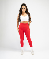 Full-body outfit featuring women’s red sculpting leggings styled with gymwear, front angle