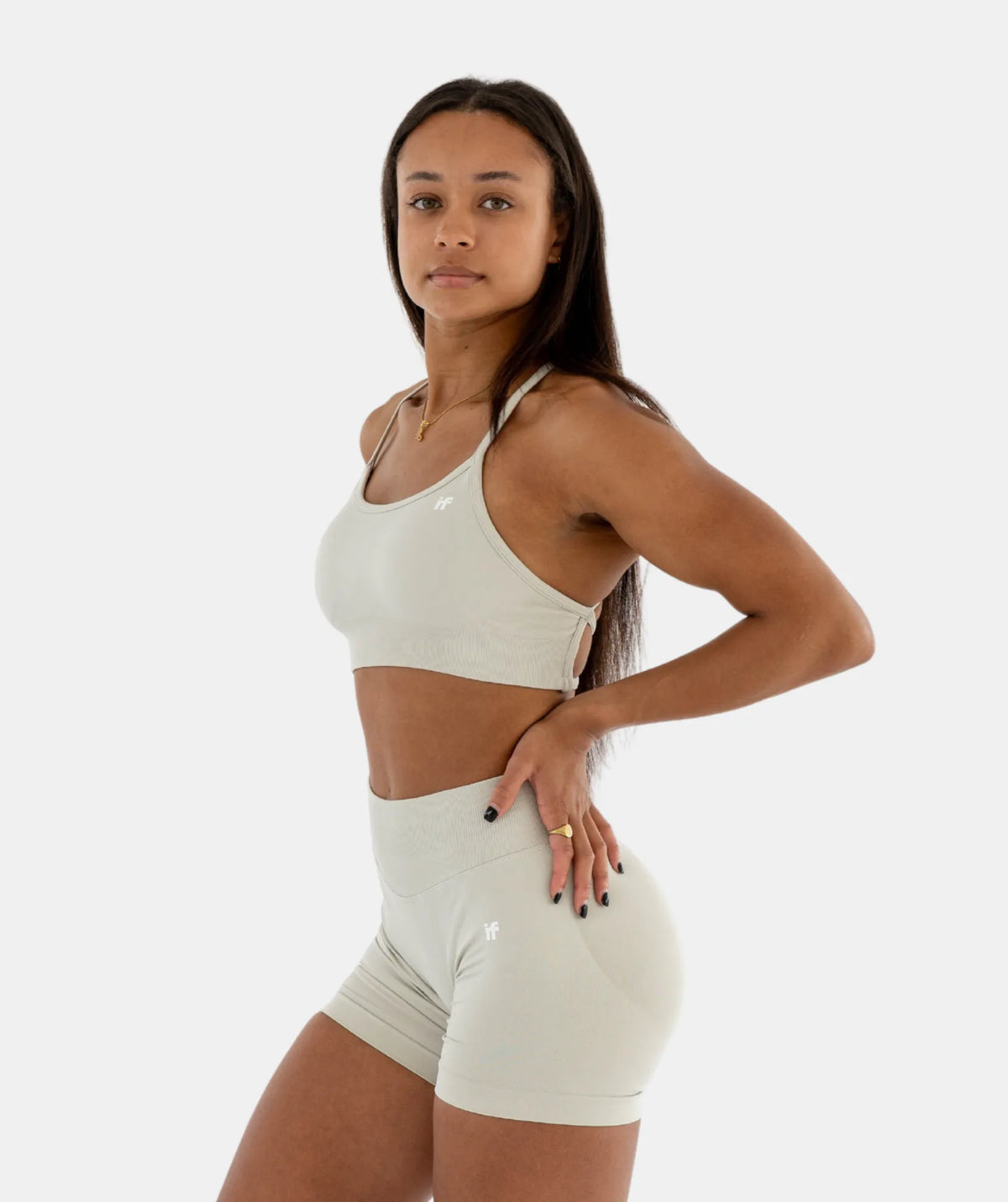 white sports bra and shorts