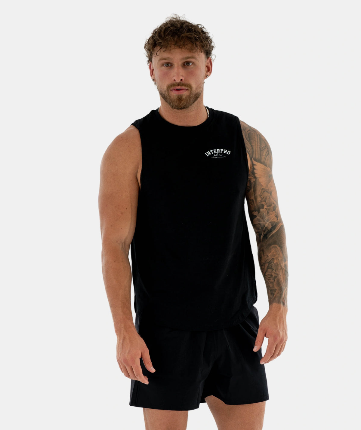 black sleeveless shirt and shorts set 
