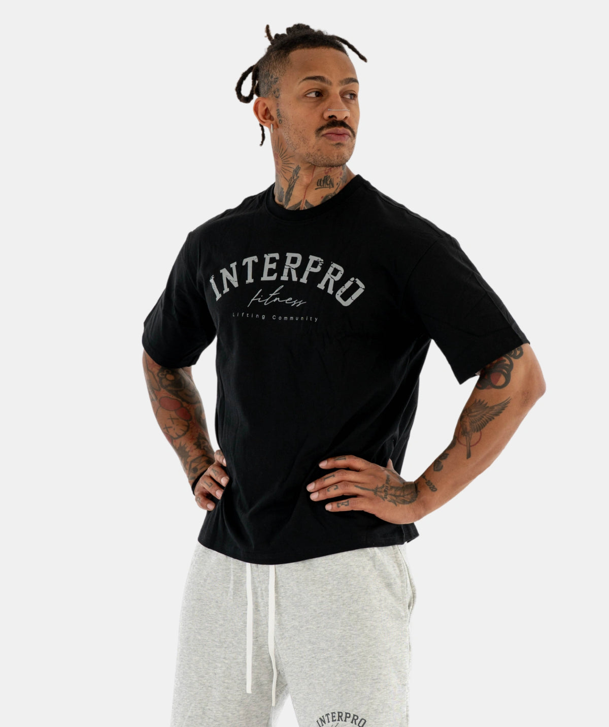Man black t-shirt and gray sweatpants 
