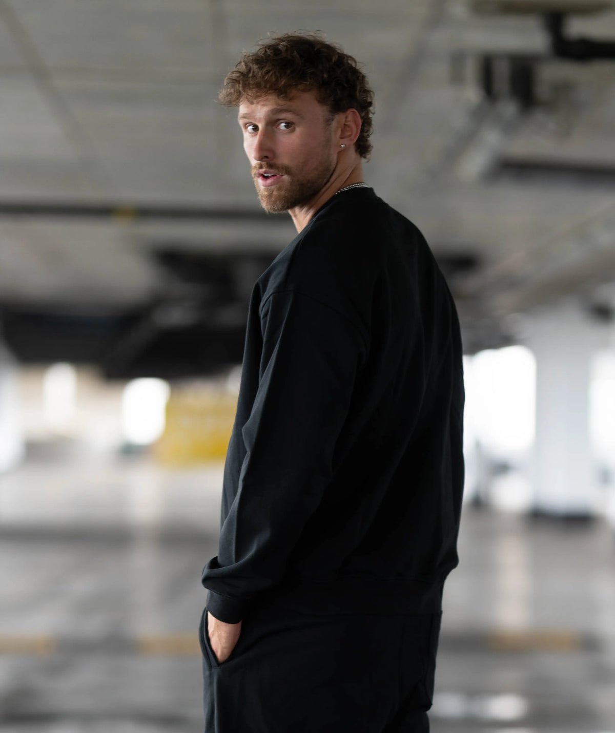 Man in a black outfit 