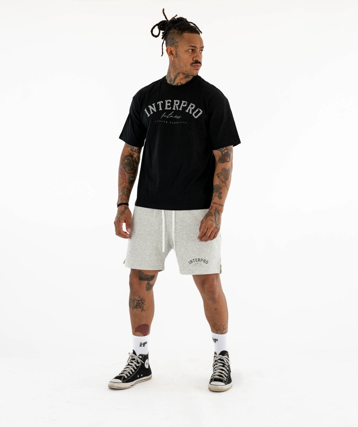 Man black t-shirt, white shorts