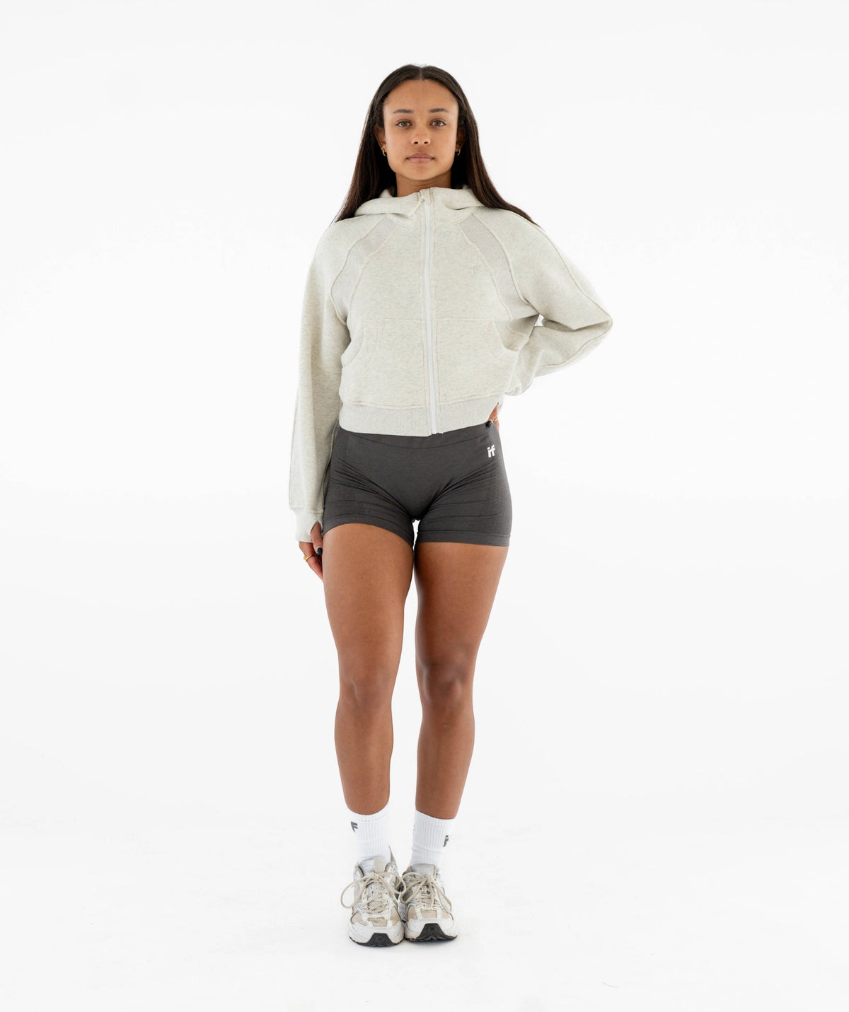 light gray hoodie and dark gray shorts 