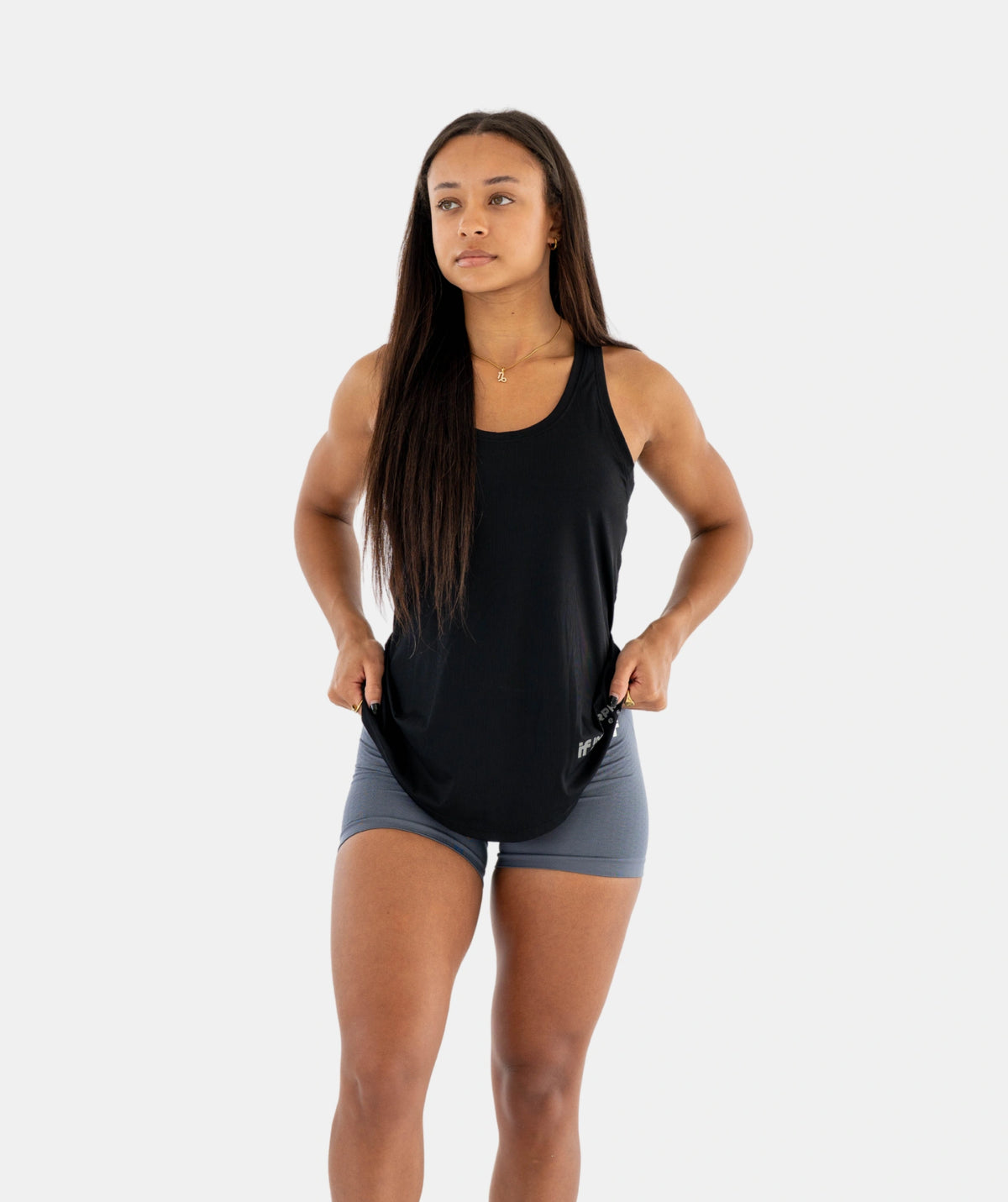 black tank top and gray shorts 