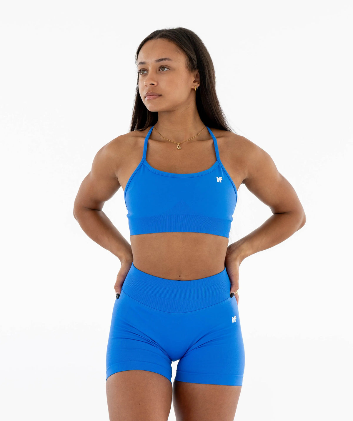 blue sports bra and shorts