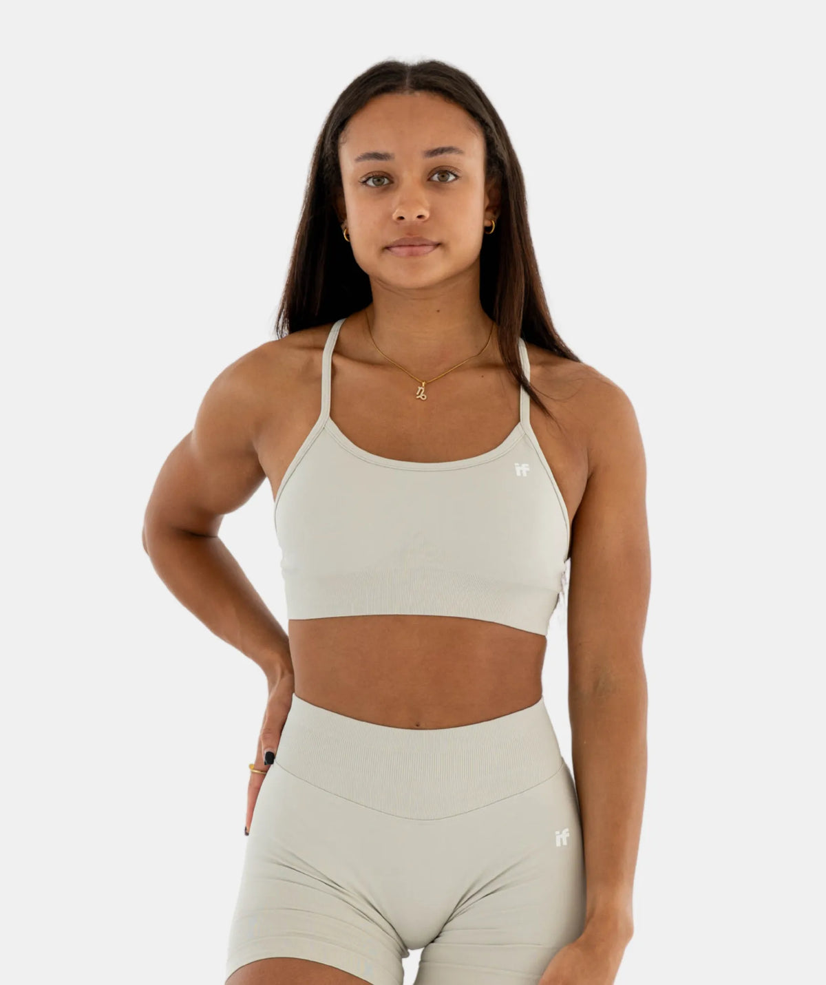 Woman wearing a beige sports bra