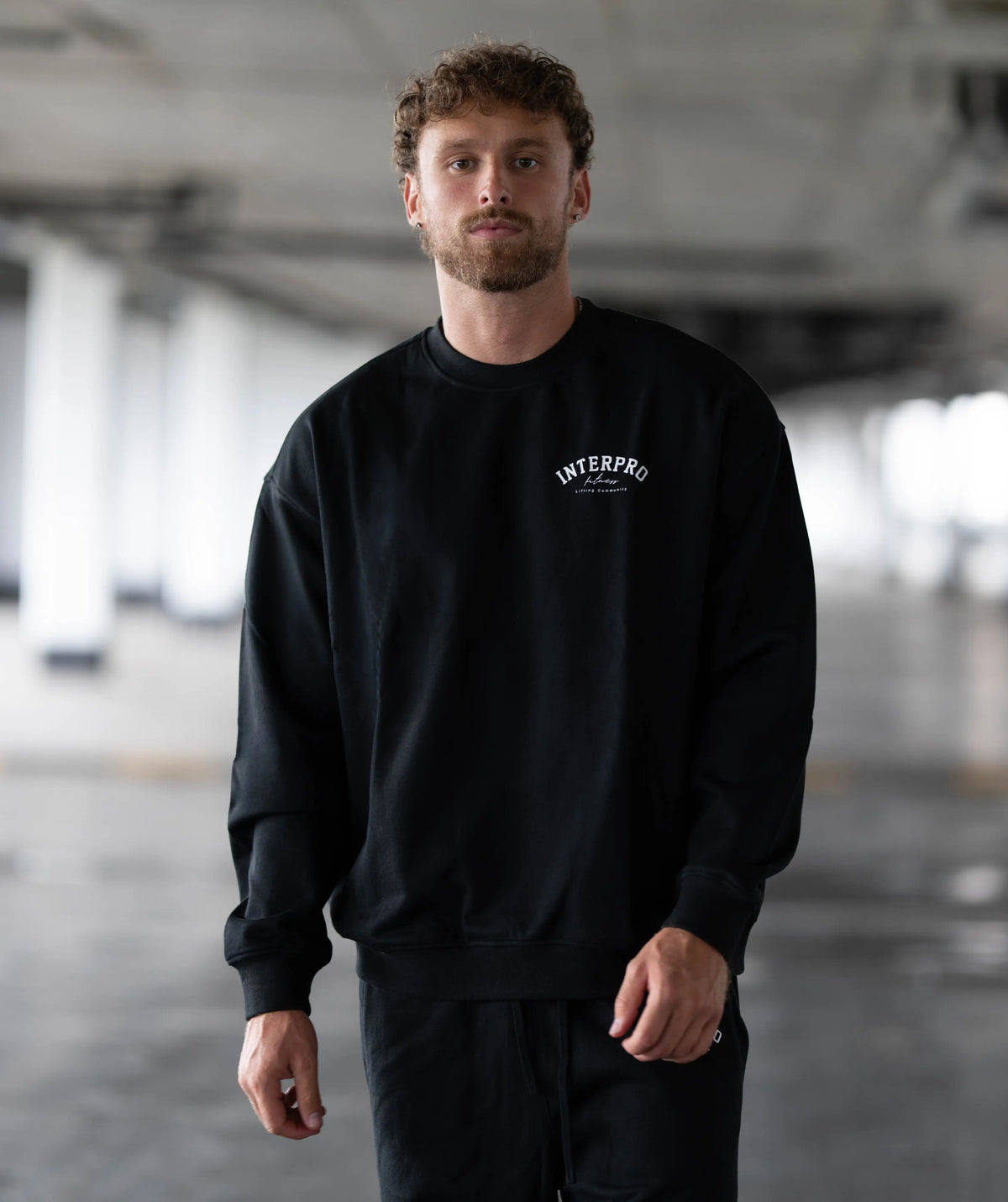 Man wearing a black sweatshirt