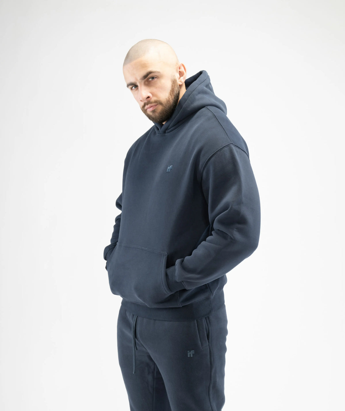 Man wearing a dark gray hoodie 