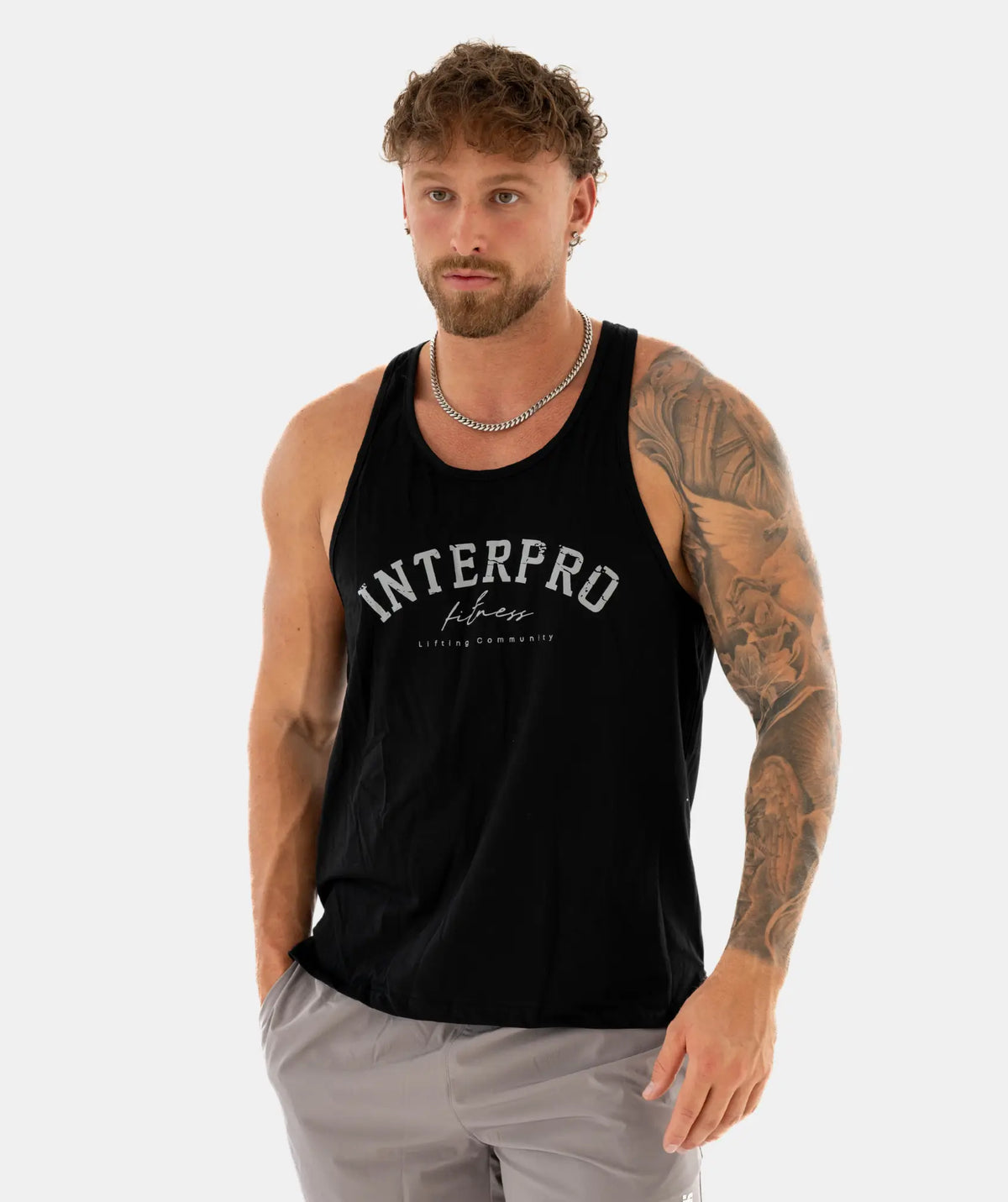 black tank top with 'INTERPRO Fitness' logo