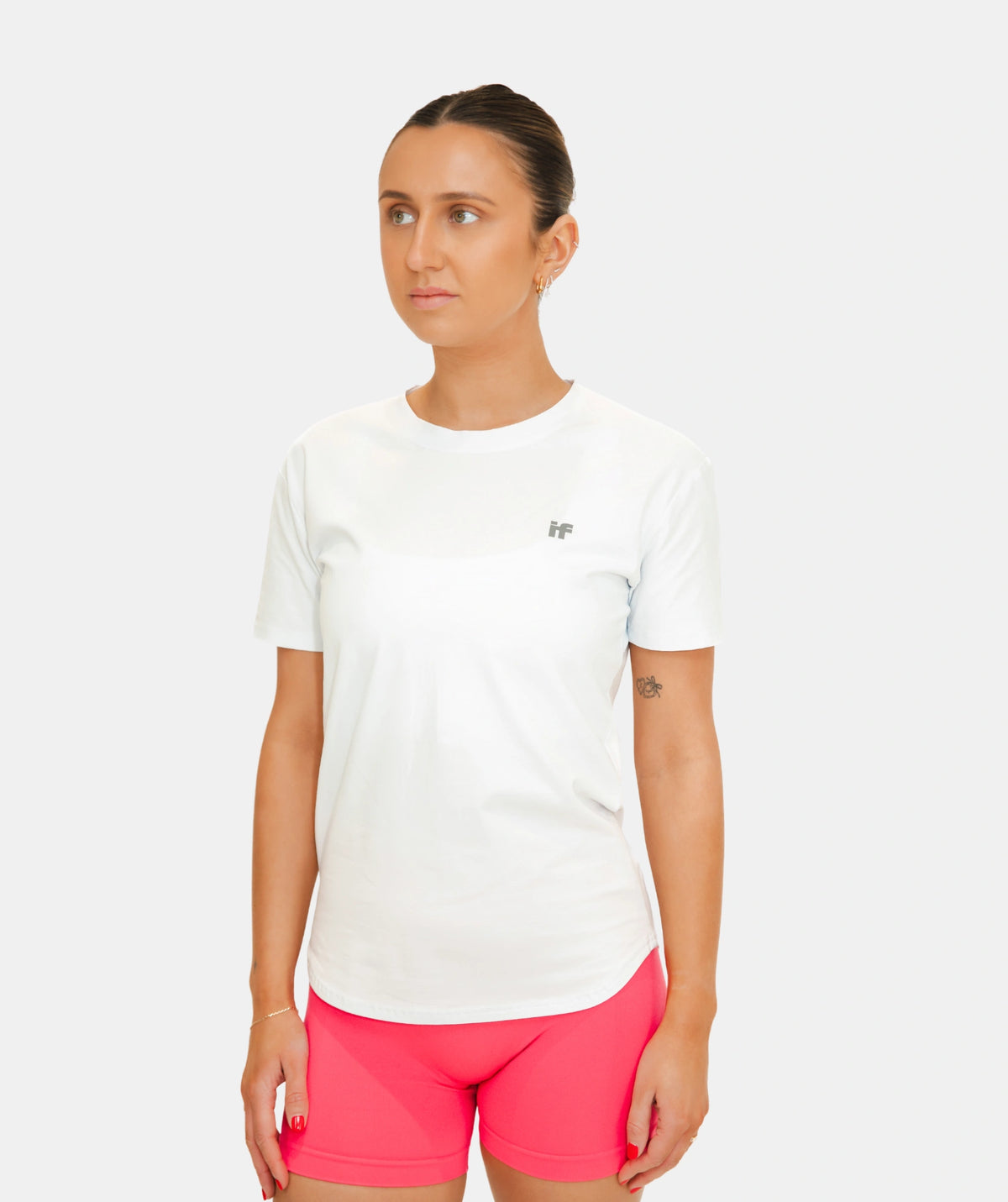 wearing a white gym t-shirt with a logo